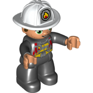 Duplo Figure with Helmet, Black Legs, Black Jacket with Red Safety Harness, White Helmet with Silver Fire Badge, Green Eyes, Stubble (Firefighter) (Black)