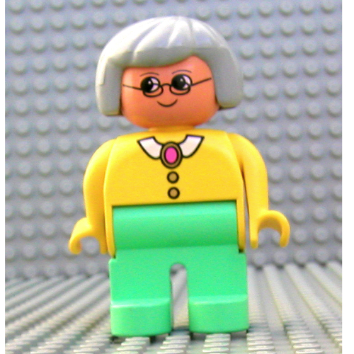 Duplo Figure, Early, Hair Bob Light Gray, Medium Green Legs, White Collar and Pink Pendant, Glasses Print (Yellow)