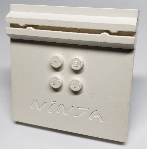 Plate Special 6 x 6 x 2/3 with 4 Studs and Embossed 'Ninja' (White)